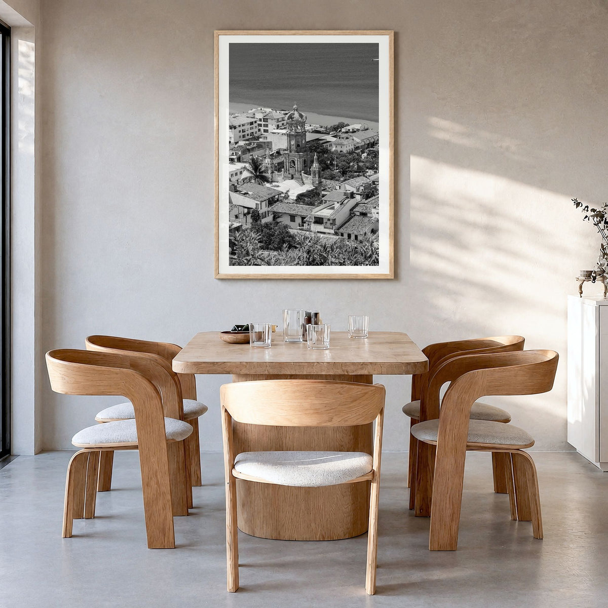Puerto Vallarta Photo Poster in a natural wood frame, hanging in a dining room, white border
