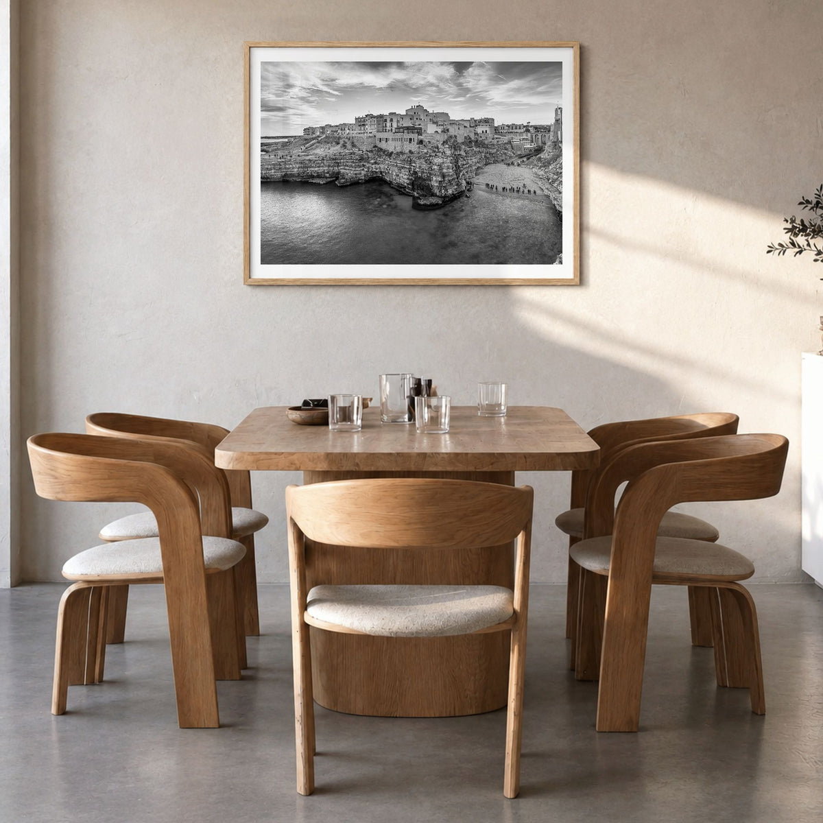 Apulia Photo Poster in a natural wood frame, hanging in a dining room, white border