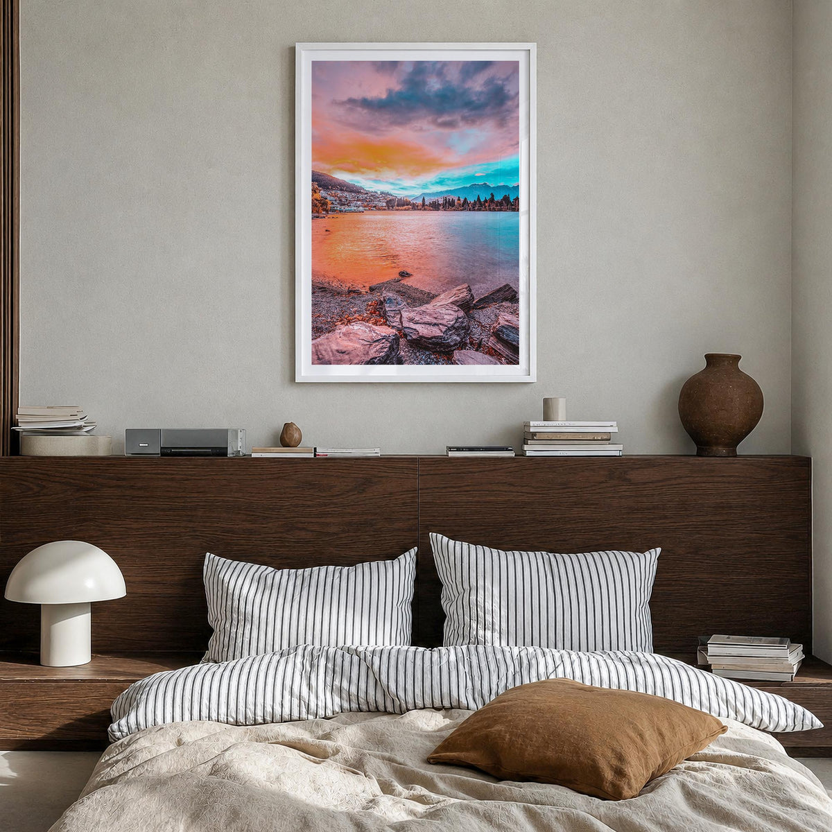 Queenstown colorful photo poster of New Zealand – vertical wall art in white wood frame with white border, hanging on wall