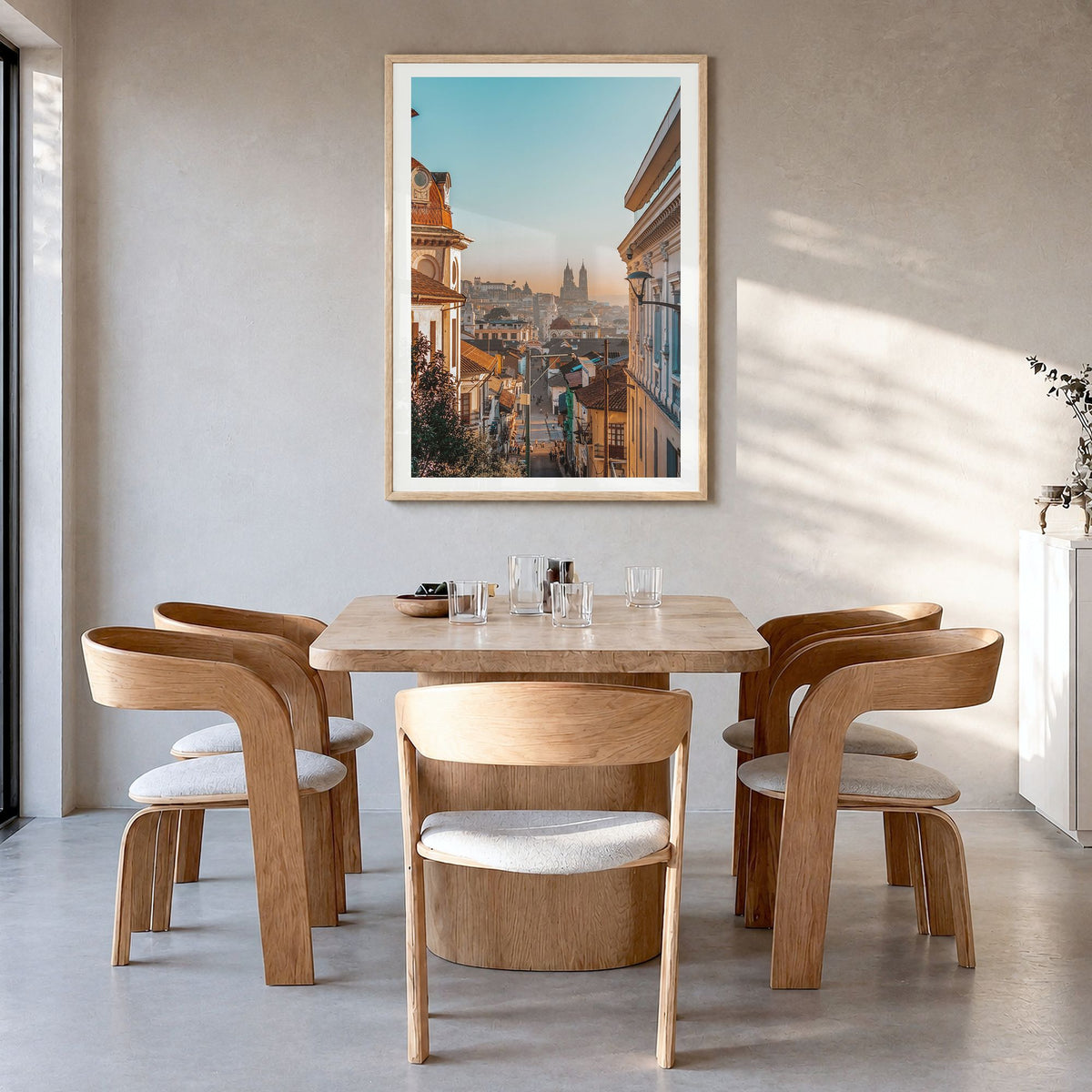 Quito Photo No 1 Poster in a natural wood frame, hanging in a dining room, white border