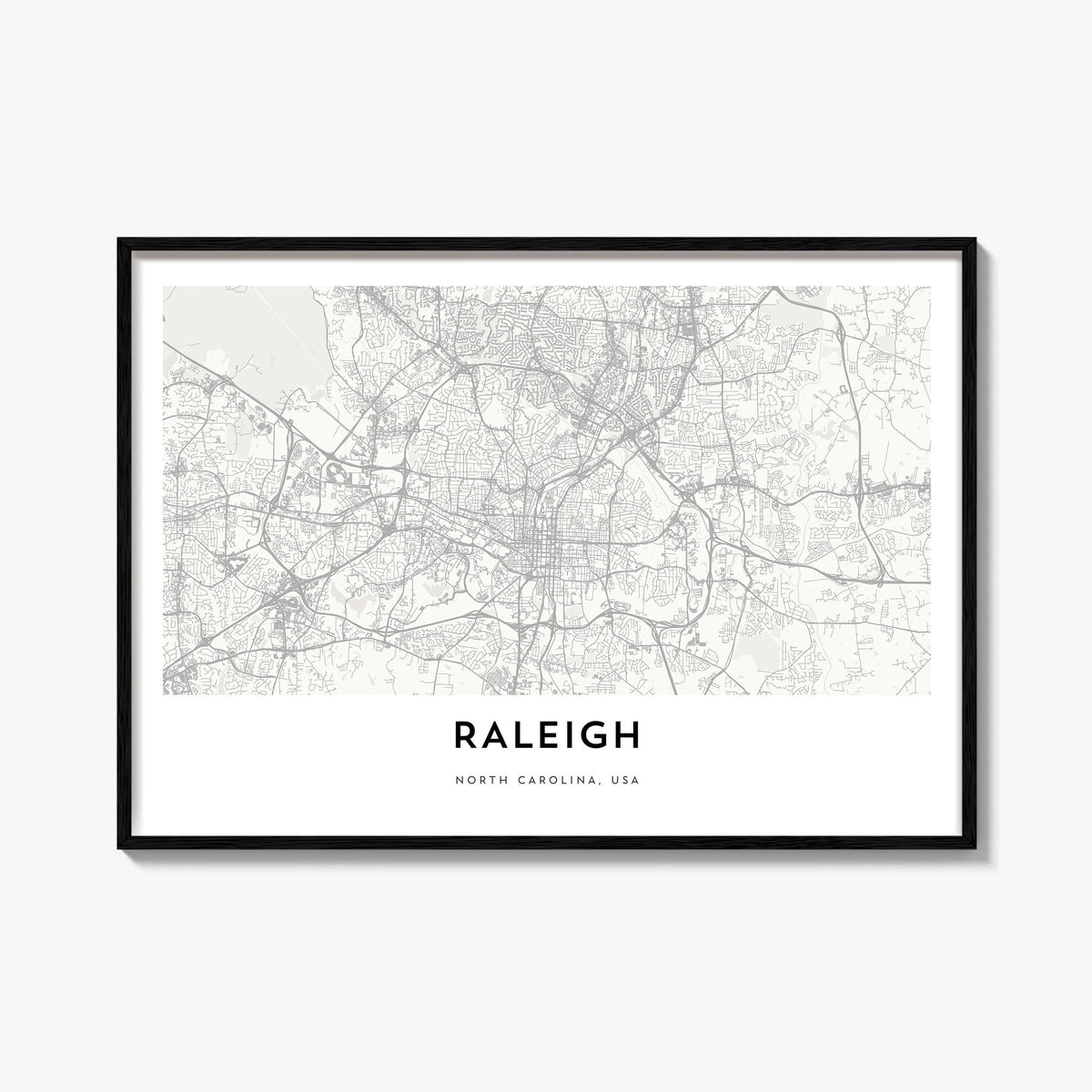 Raleigh black & white map poster of North Carolina, USA – horizontal wall art, unframed print shown in interior mockup