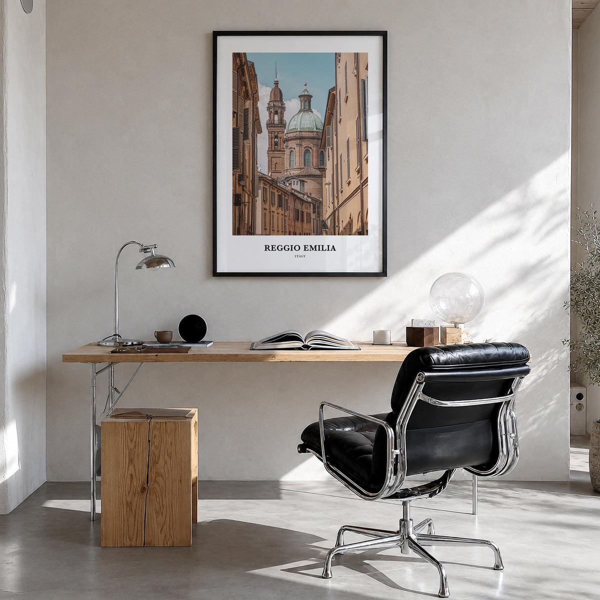 Reggio Emilia colorful classic poster of Italy – vertical wall art in black wood frame, hanging on wall