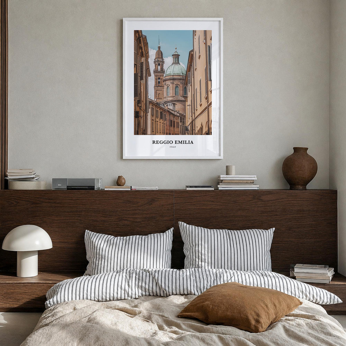 Reggio Emilia colorful classic poster of Italy – vertical wall art in white wood frame, hanging on wall