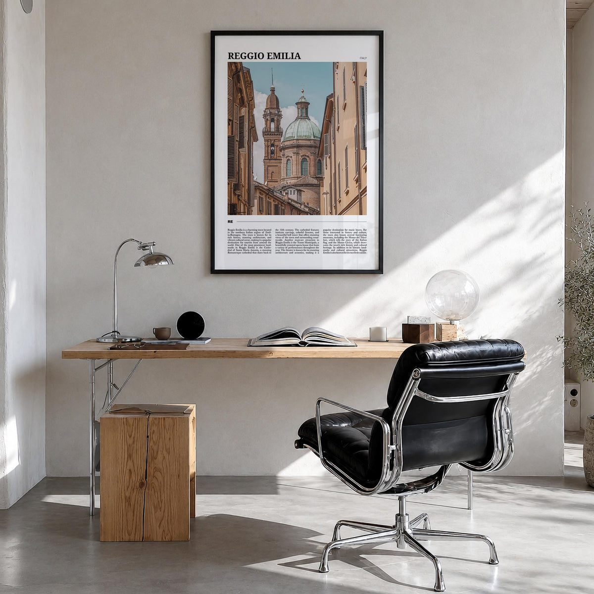 Reggio Emilia colorful travel poster of Italy – vertical wall art in black wood frame, hanging on wall