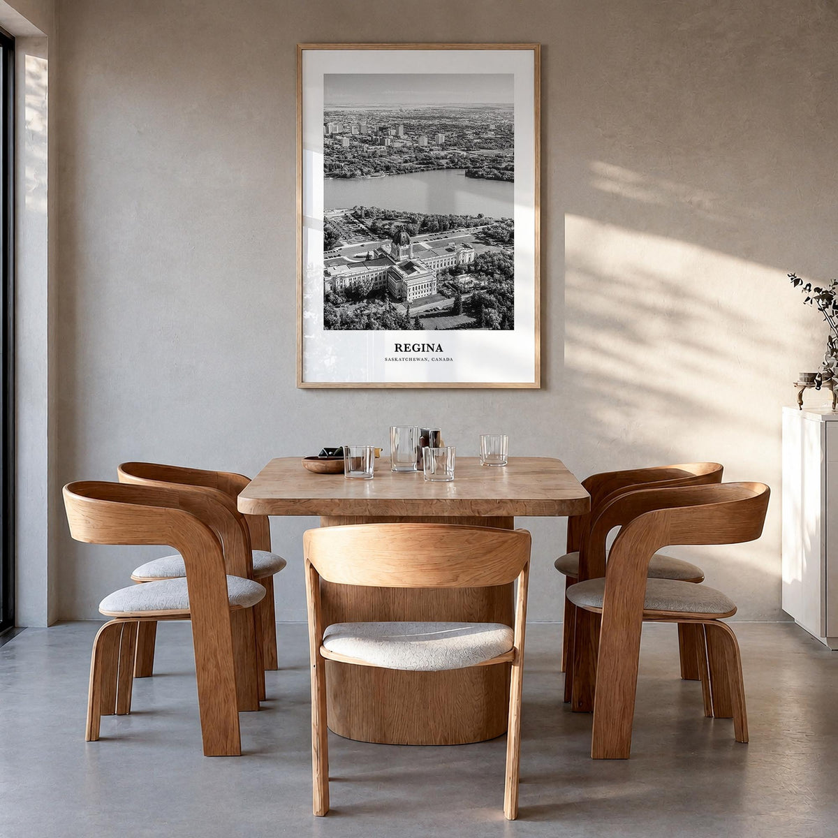 Regina black & white classic poster of Saskatchewan, Canada – vertical wall art in natural wood frame, hanging on wall