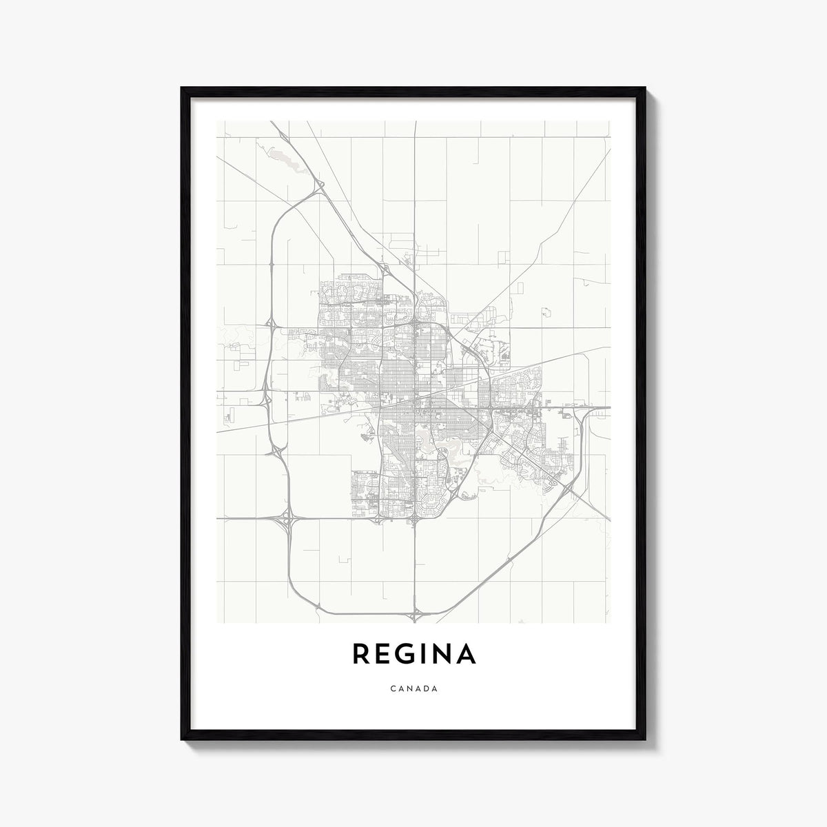 Regina black & white map poster of Saskatchewan, Canada – vertical wall art, unframed print shown in interior mockup