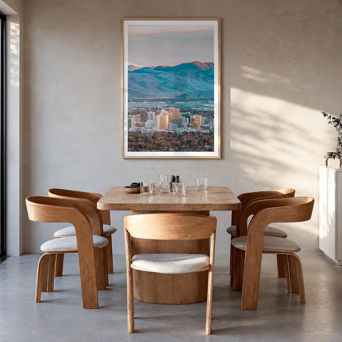 Reno colorful photo poster of Nevada, USA – vertical wall art in natural wood frame with white border, hanging on wall