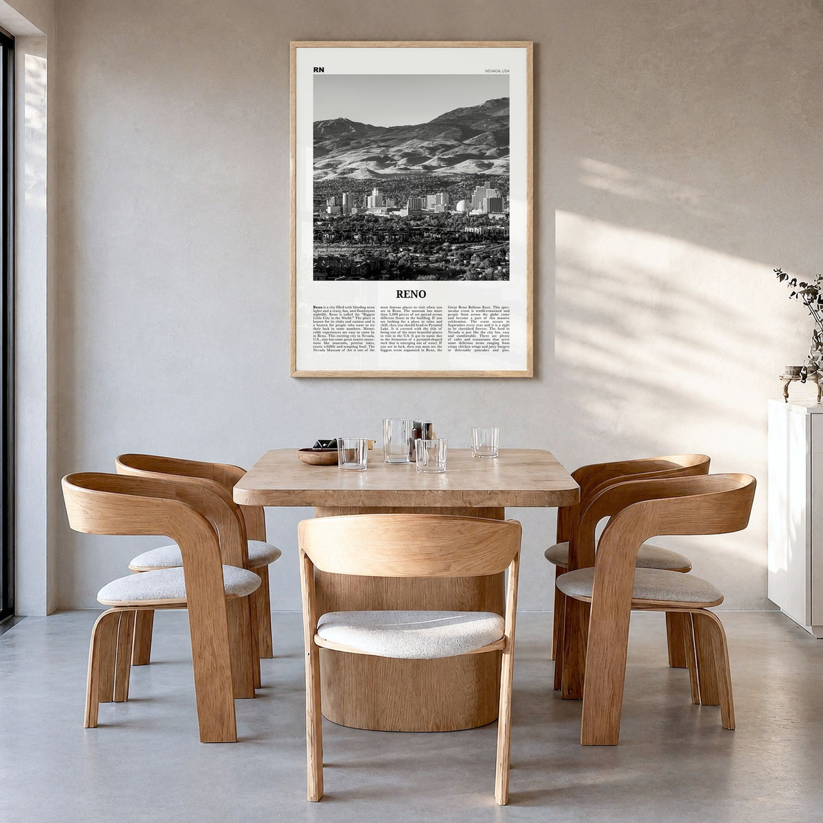 Reno Newspaper Poster in a natural wood frame, hanging in a dining room