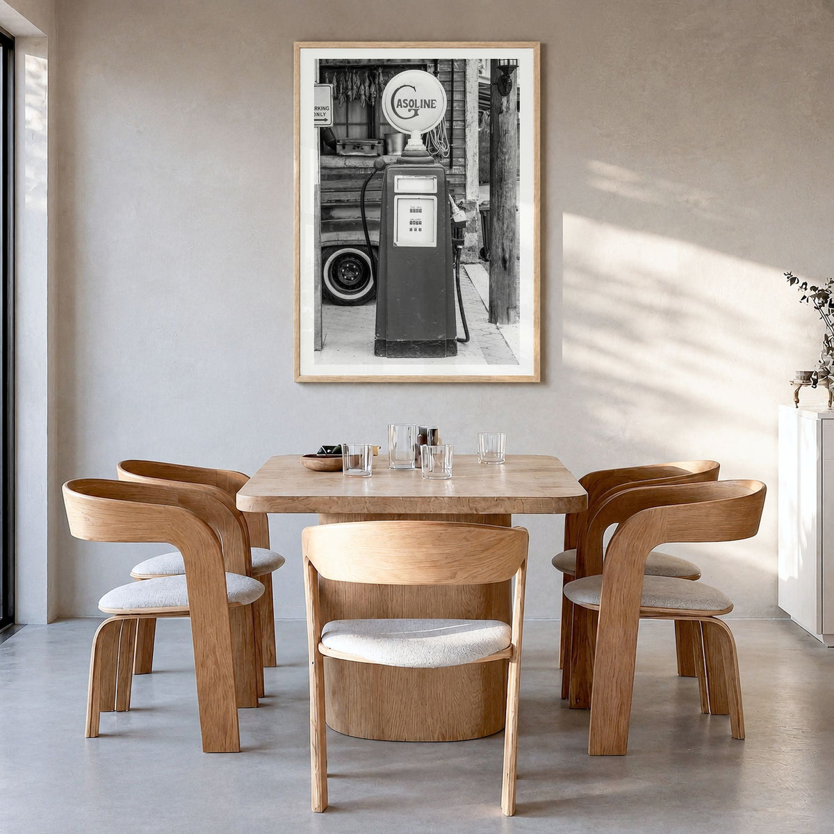 Retro Gas Pump Photo Poster in a natural wood frame, hanging in a dining room, white border