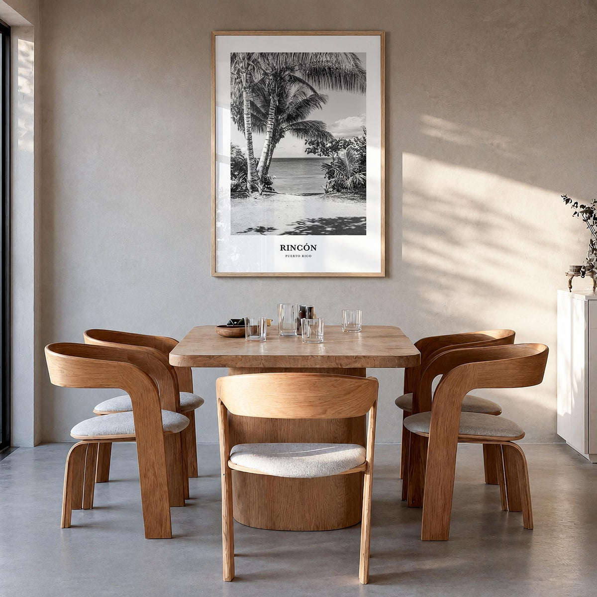 Rincón black & white classic poster of Puerto Rico – vertical wall art in natural wood frame, hanging on wall