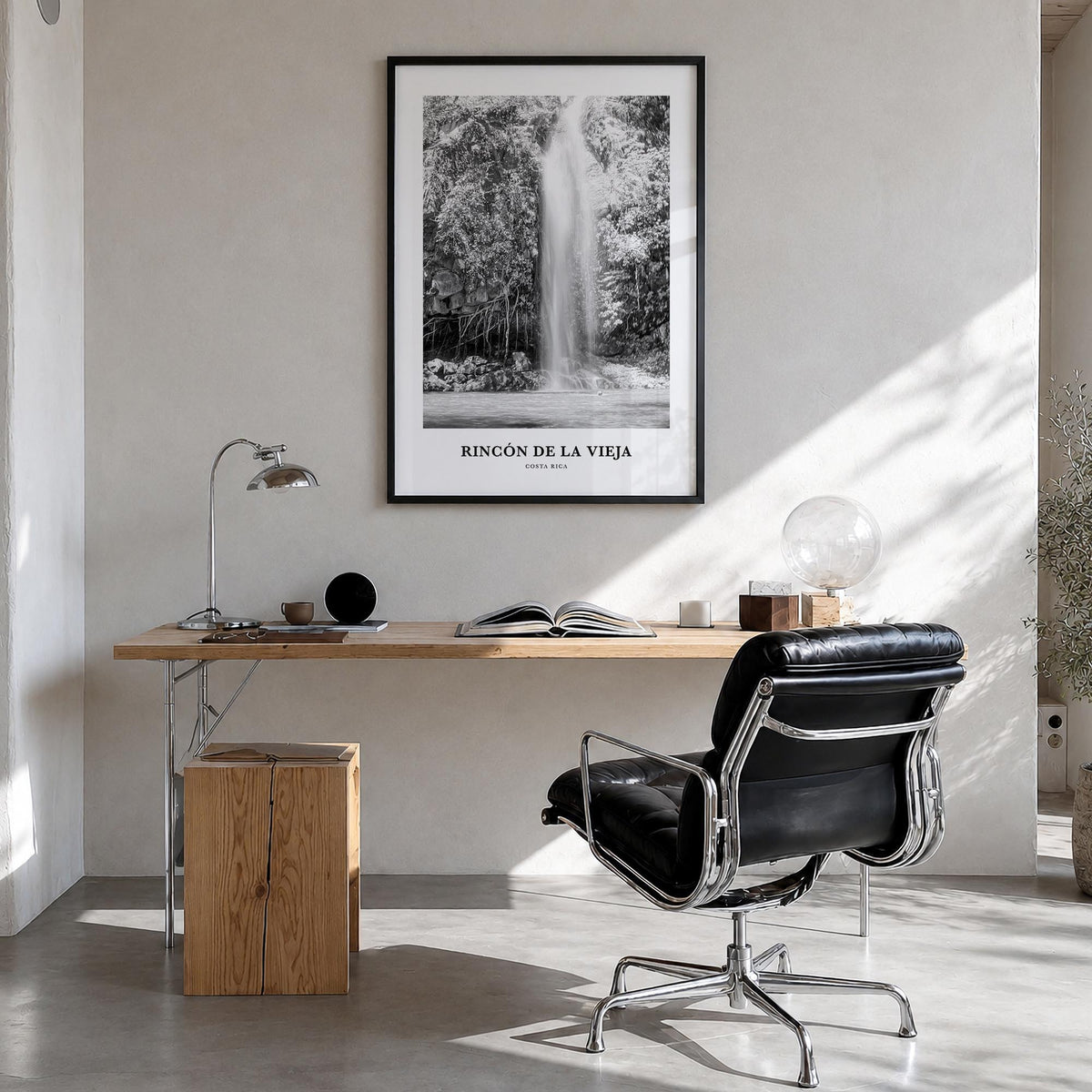 Rincón de la Vieja black & white classic poster of Costa Rica – vertical wall art in black wood frame, hanging on wall