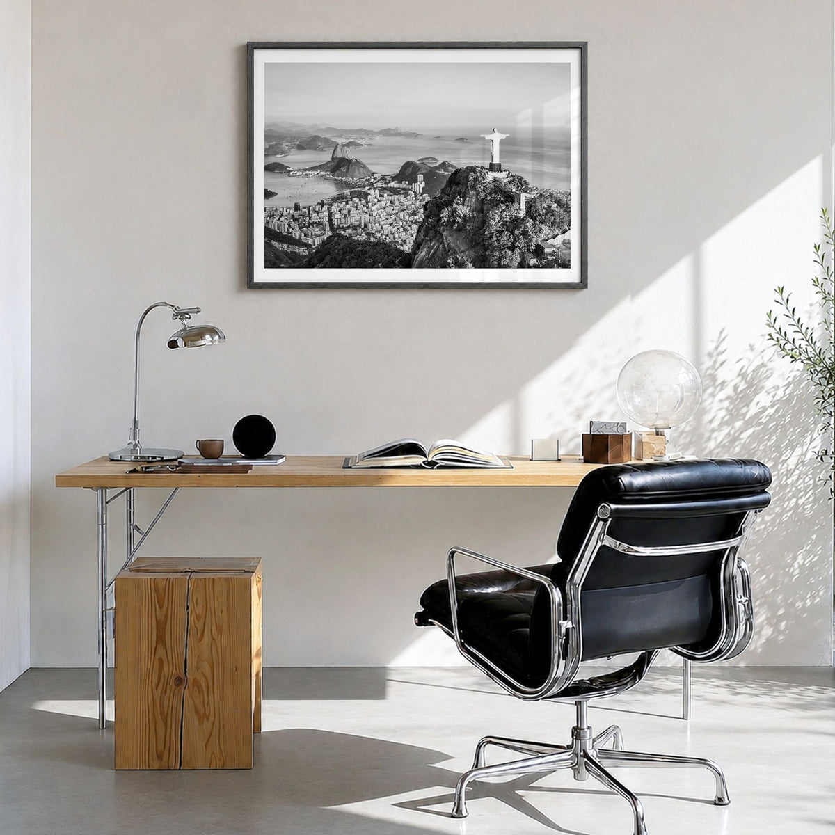Rio de Janeiro Photo Poster in a black wood frame, hanging in a bright home office, white border