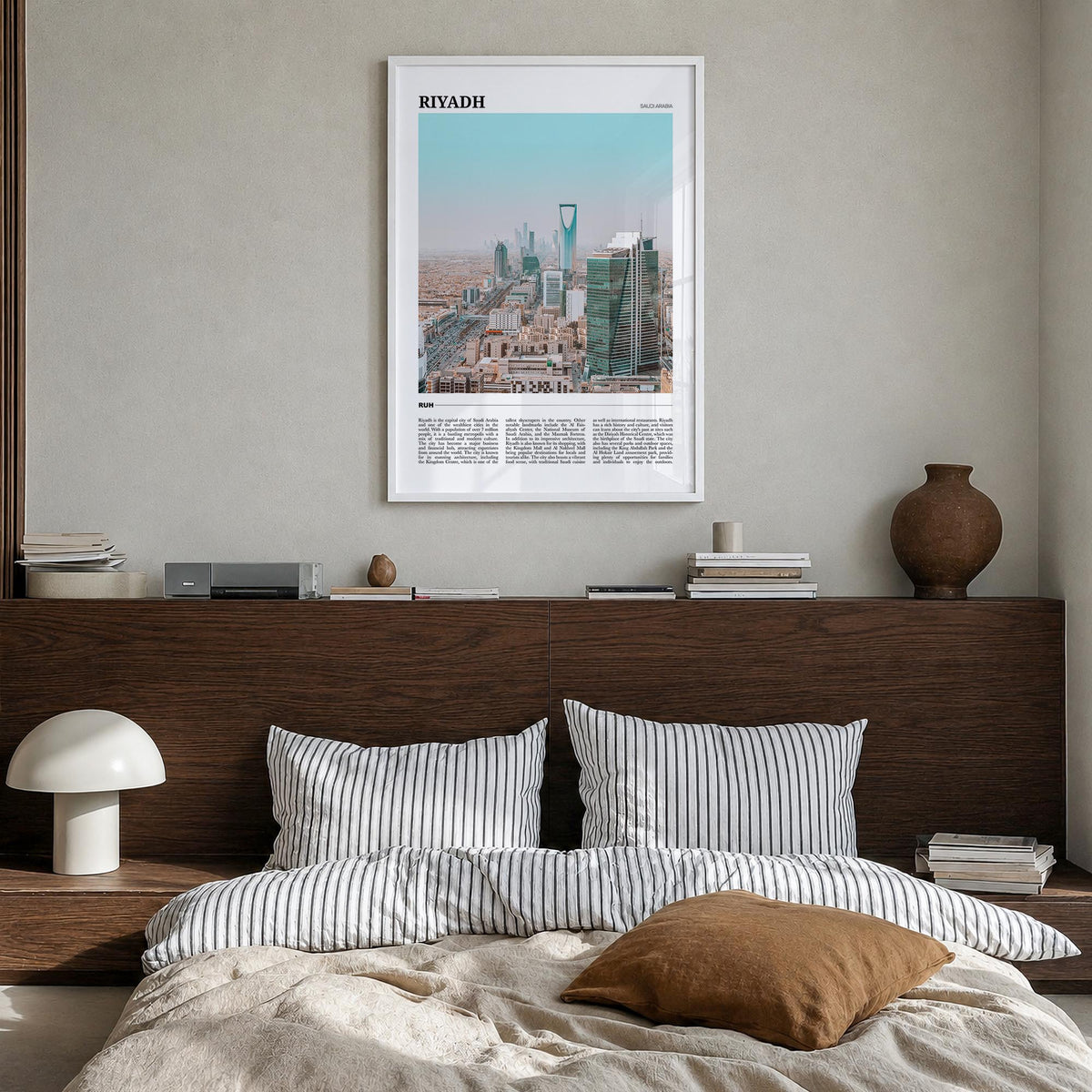 Riyadh colorful travel poster of Saudi Arabia – vertical wall art in white wood frame, hanging on wall
