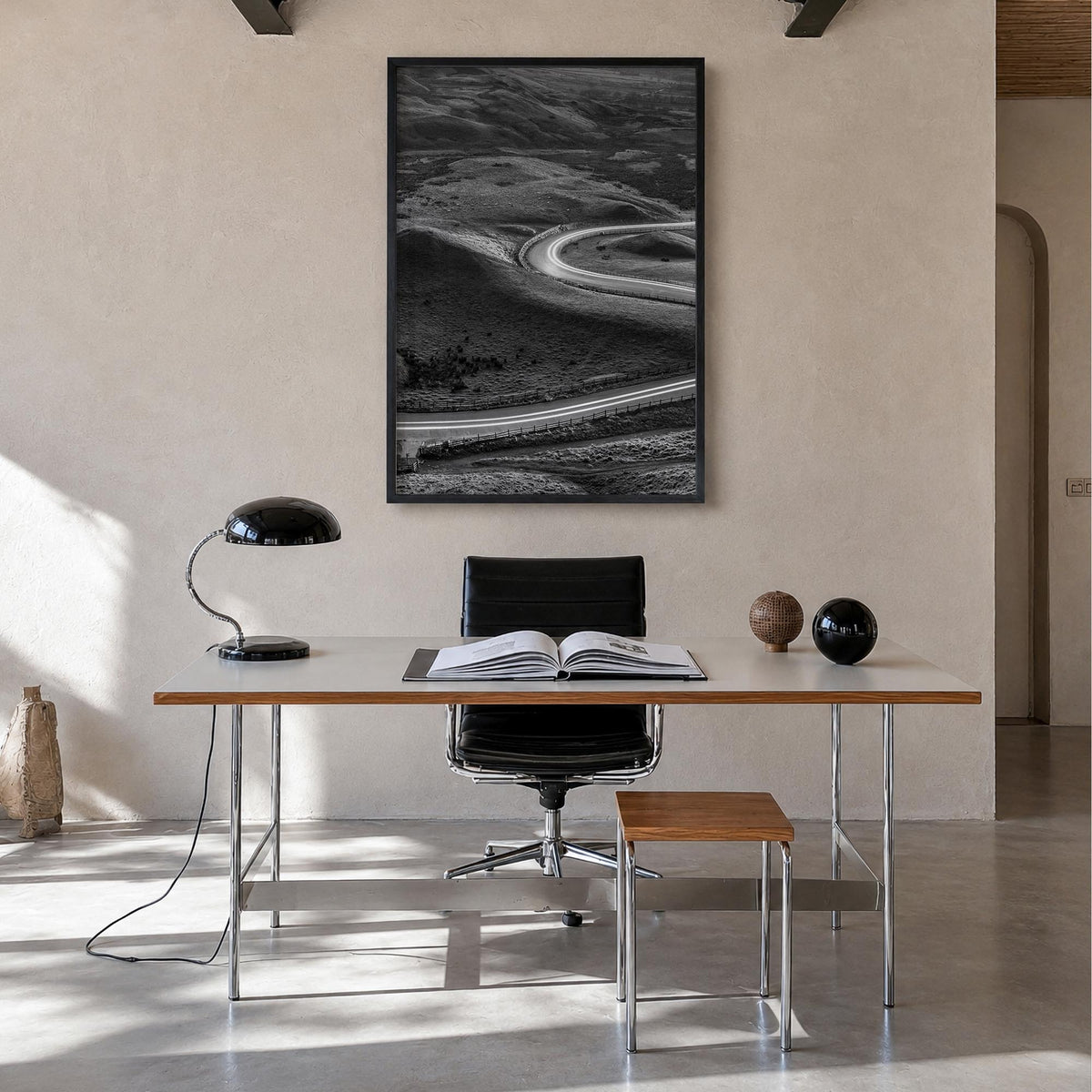 Road black & white photo poster – vertical wall art in black wood frame, hanging on wall