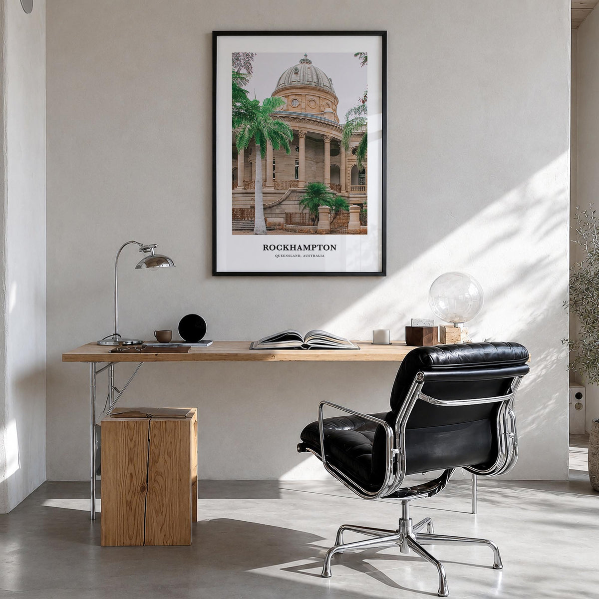 Rockhampton colorful classic poster of Australia – vertical wall art in black wood frame, hanging on wall