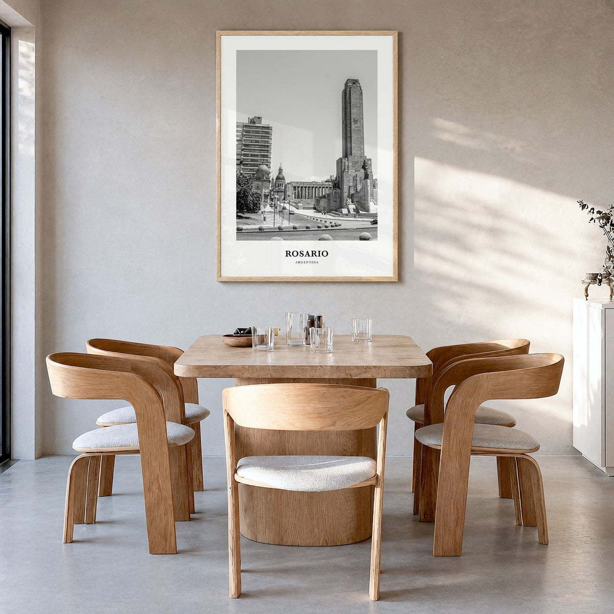 Rosario Classic No 1 Poster in a natural wood frame, hanging in a dining room