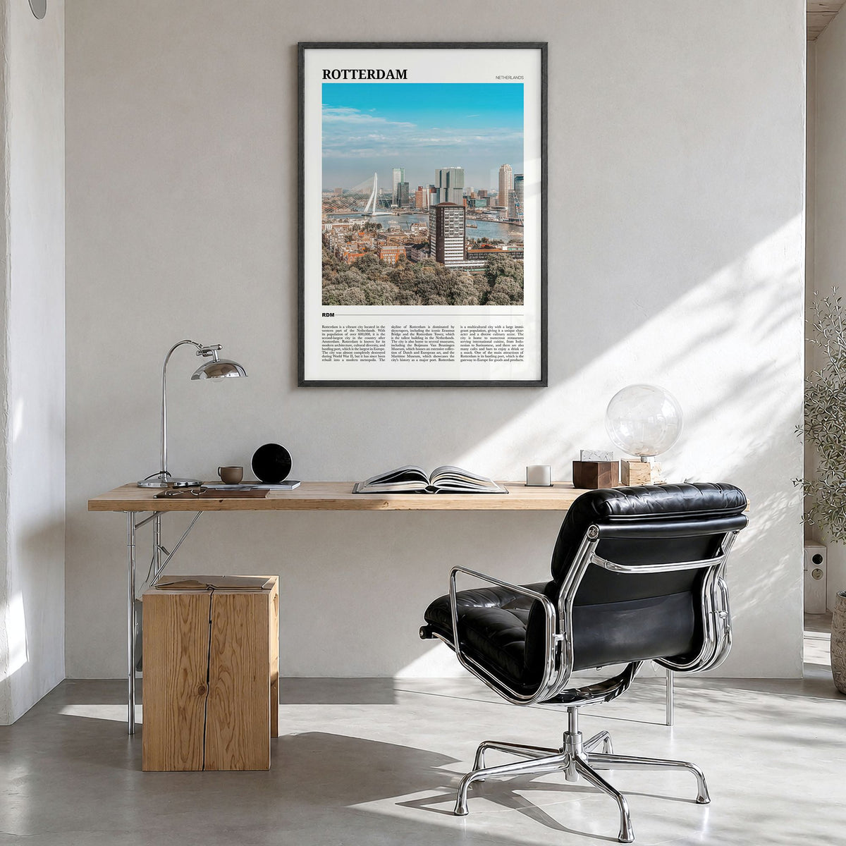 Rotterdam Travel Poster in a black wood frame, hanging in a bright home office