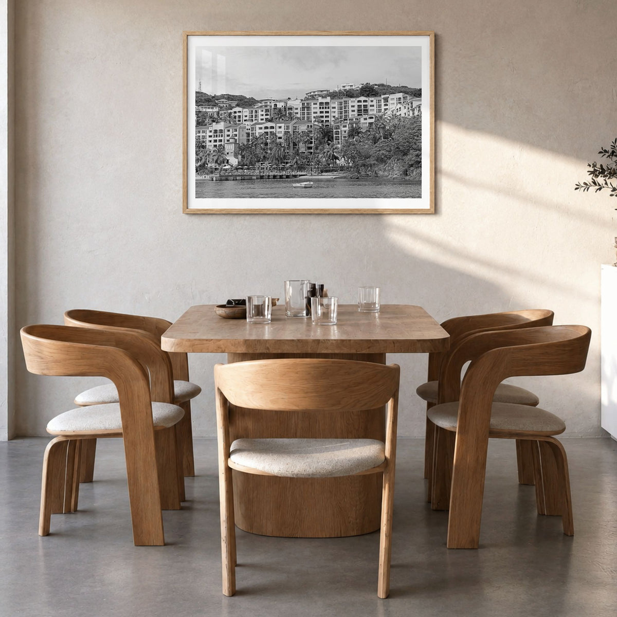 Saint Thomas Photo Poster in a natural wood frame, hanging in a dining room, white border