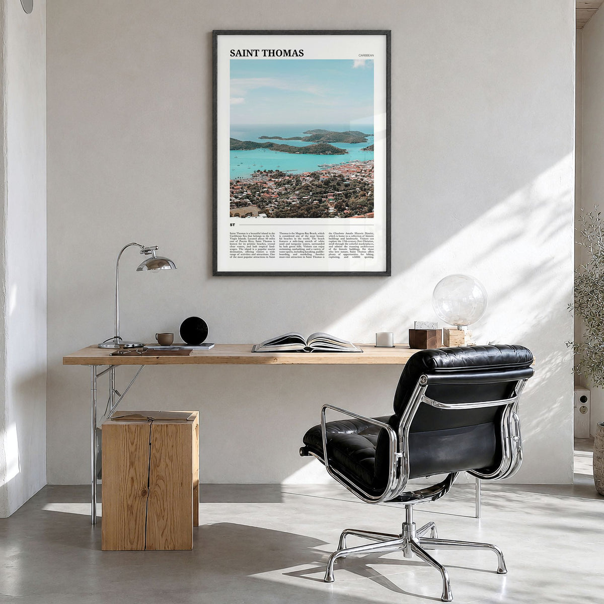 Saint Thomas Travel Poster in a black wood frame, hanging in a bright home office