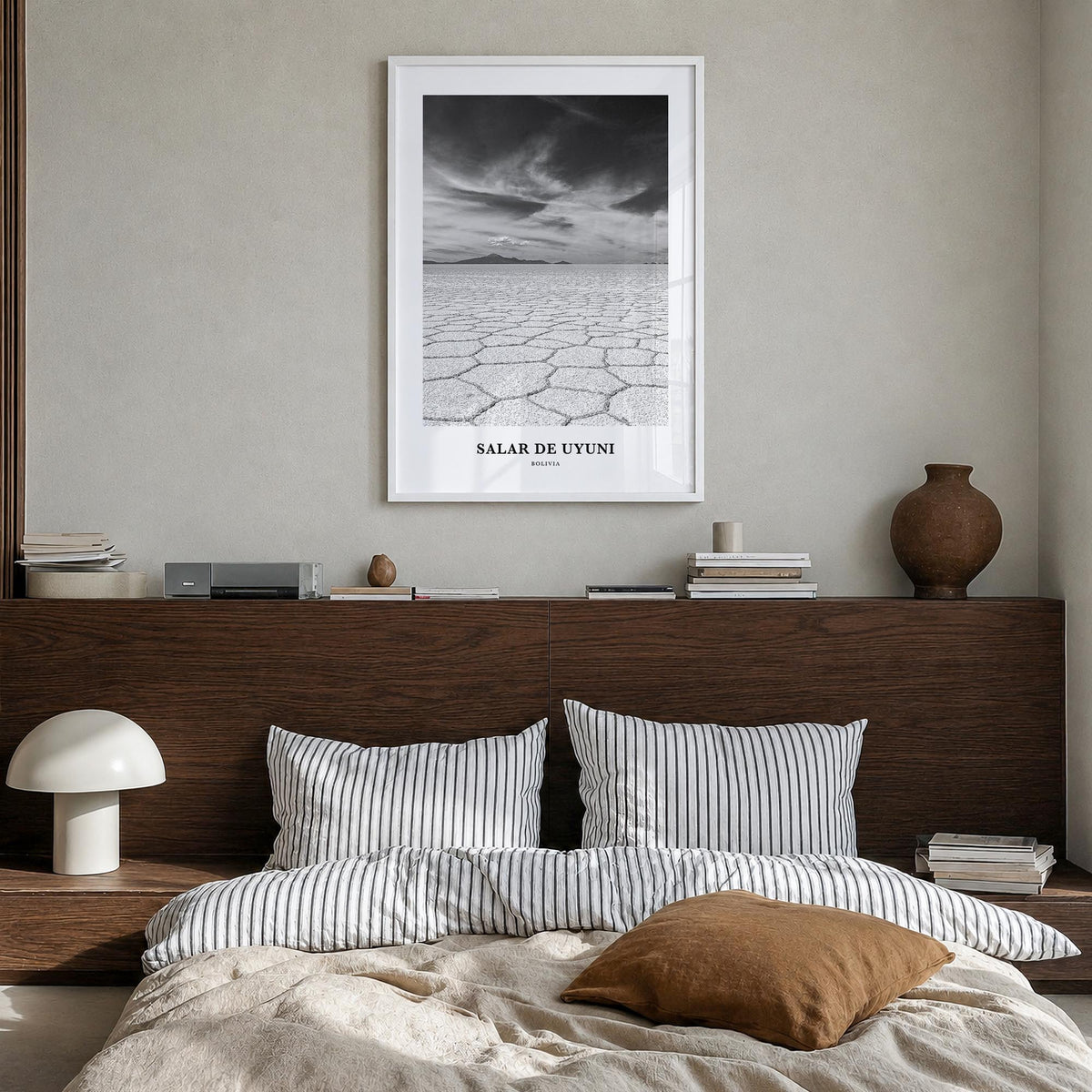 Salar de Uyuni black & white classic poster of Bolivia – vertical wall art in white wood frame, hanging on wall