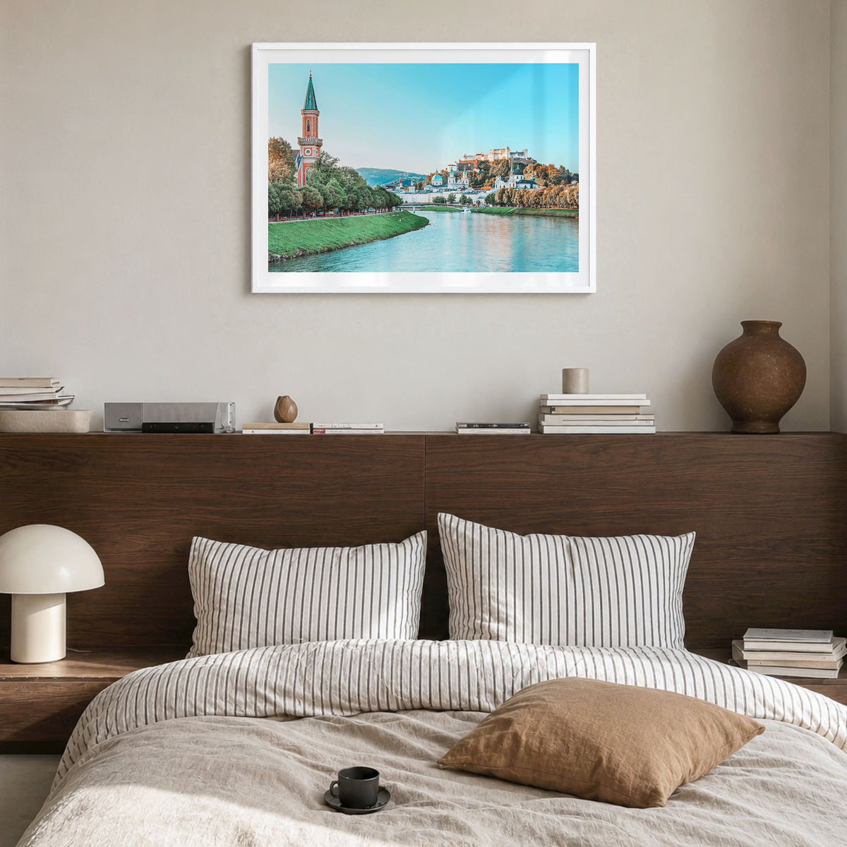 Salzburg Photo Poster in a white wood frame, hanging in a bedroom, white border
