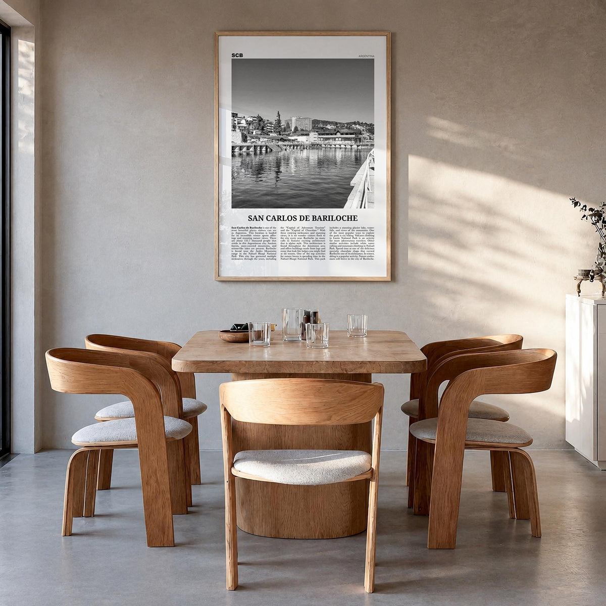 San Carlos de Bariloche black & white newspaper poster of Argentina – vertical wall art in natural wood frame, hanging on wal