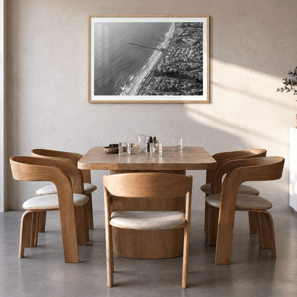 San Clemente Photo Poster in a natural wood frame, hanging in a dining room, white border