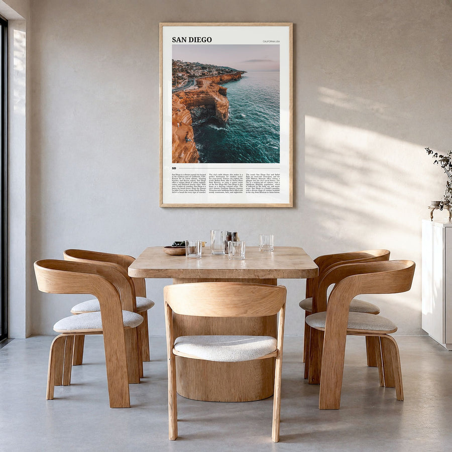 San Diego Travel No 1 Poster in a natural wood frame, hanging in a dining room