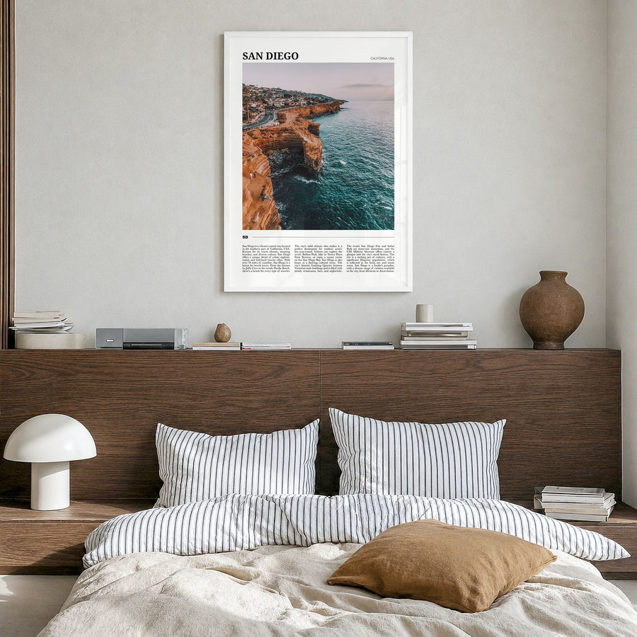 San Diego Travel No 1 Poster in a white wood frame, hanging in a bedroom