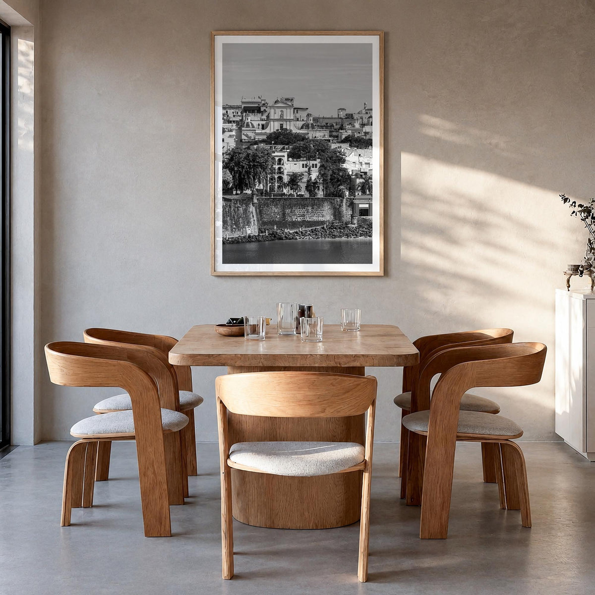 San Juan black & white photo poster of Puerto Rico – vertical wall art in natural wood frame with white border, hanging on wa
