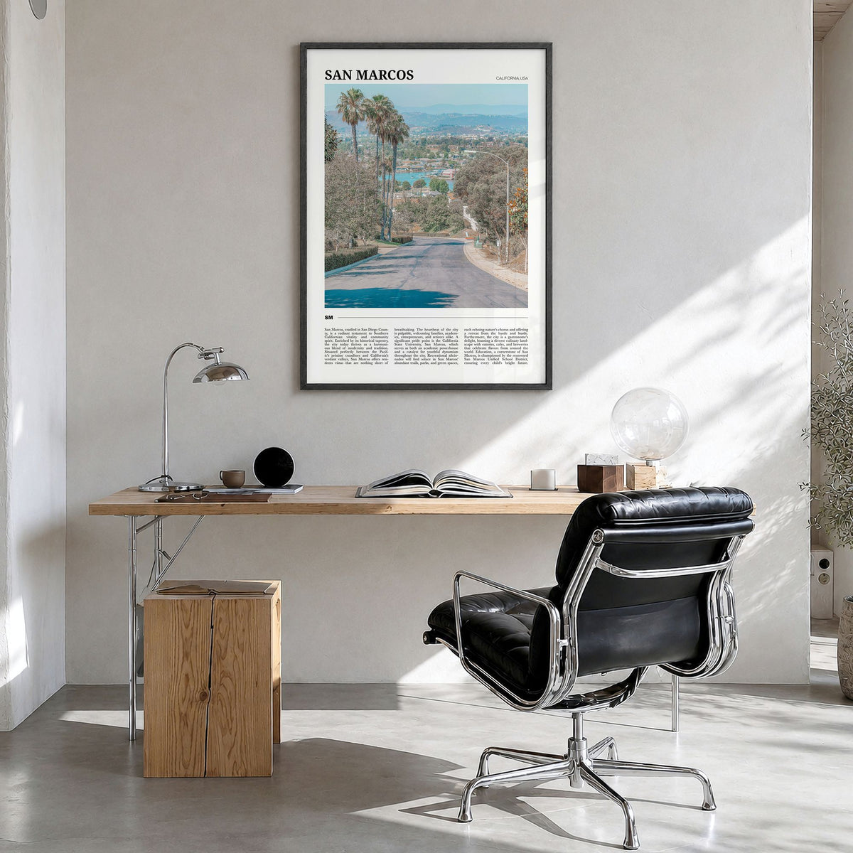 San Marcos Travel Poster in a black wood frame, hanging in a bright home office