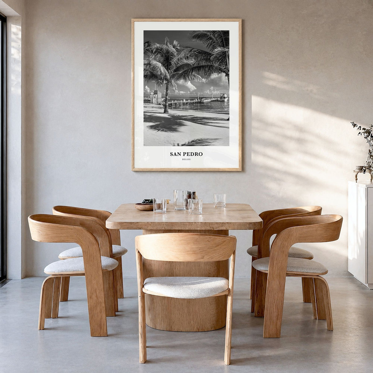 San Pedro, Belize Classic Poster in a natural wood frame, hanging in a dining room
