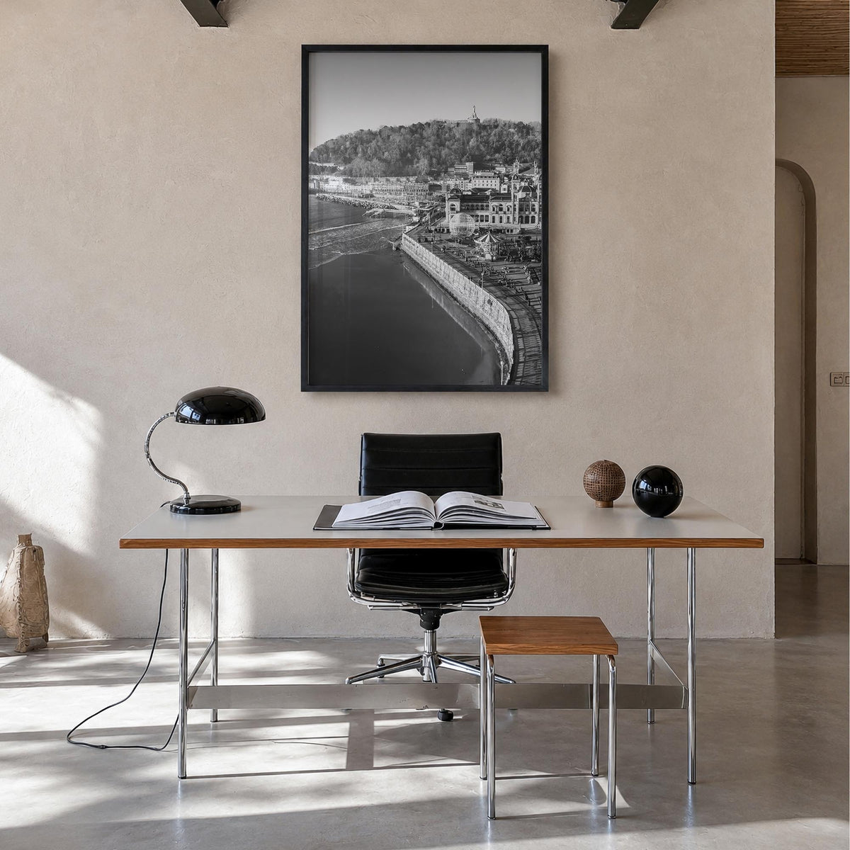San Sebastián black & white photo poster of Spain – vertical wall art in black wood frame, hanging on wall