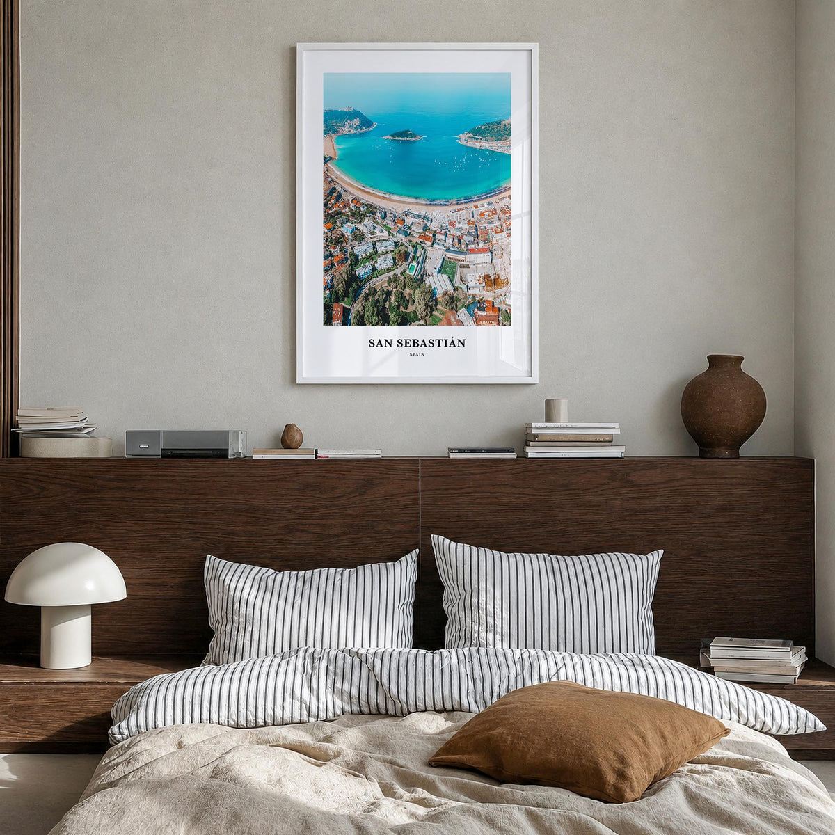 San Sebastián colorful classic poster of Spain – vertical wall art in white wood frame, hanging on wall