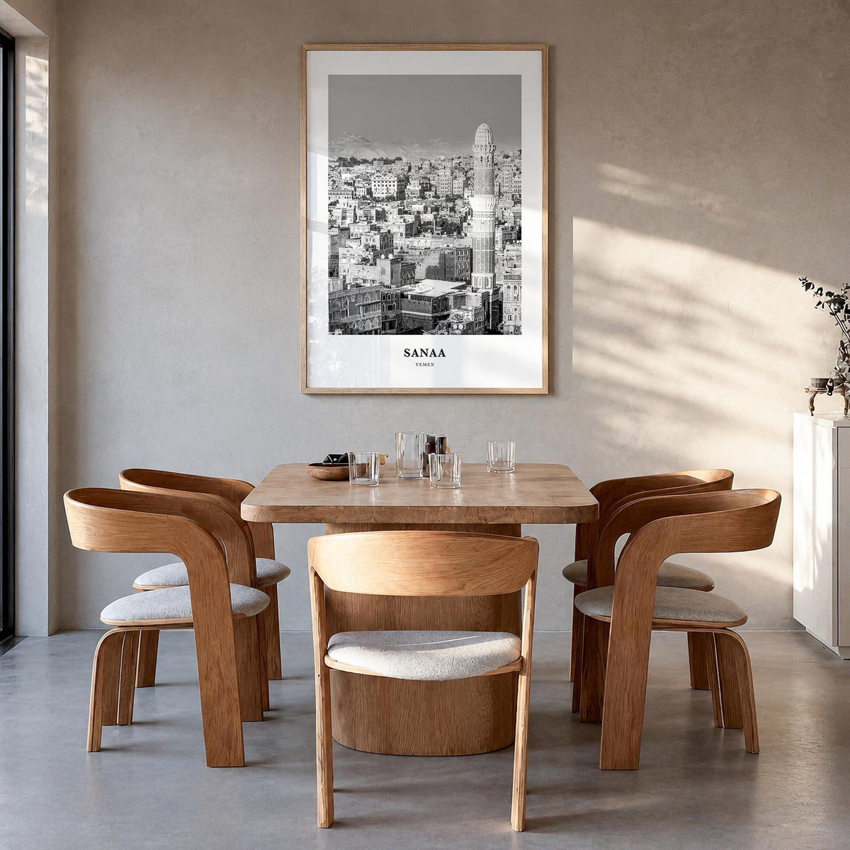 Sana'a black & white classic poster of Yemen – vertical wall art in natural wood frame, hanging on wall