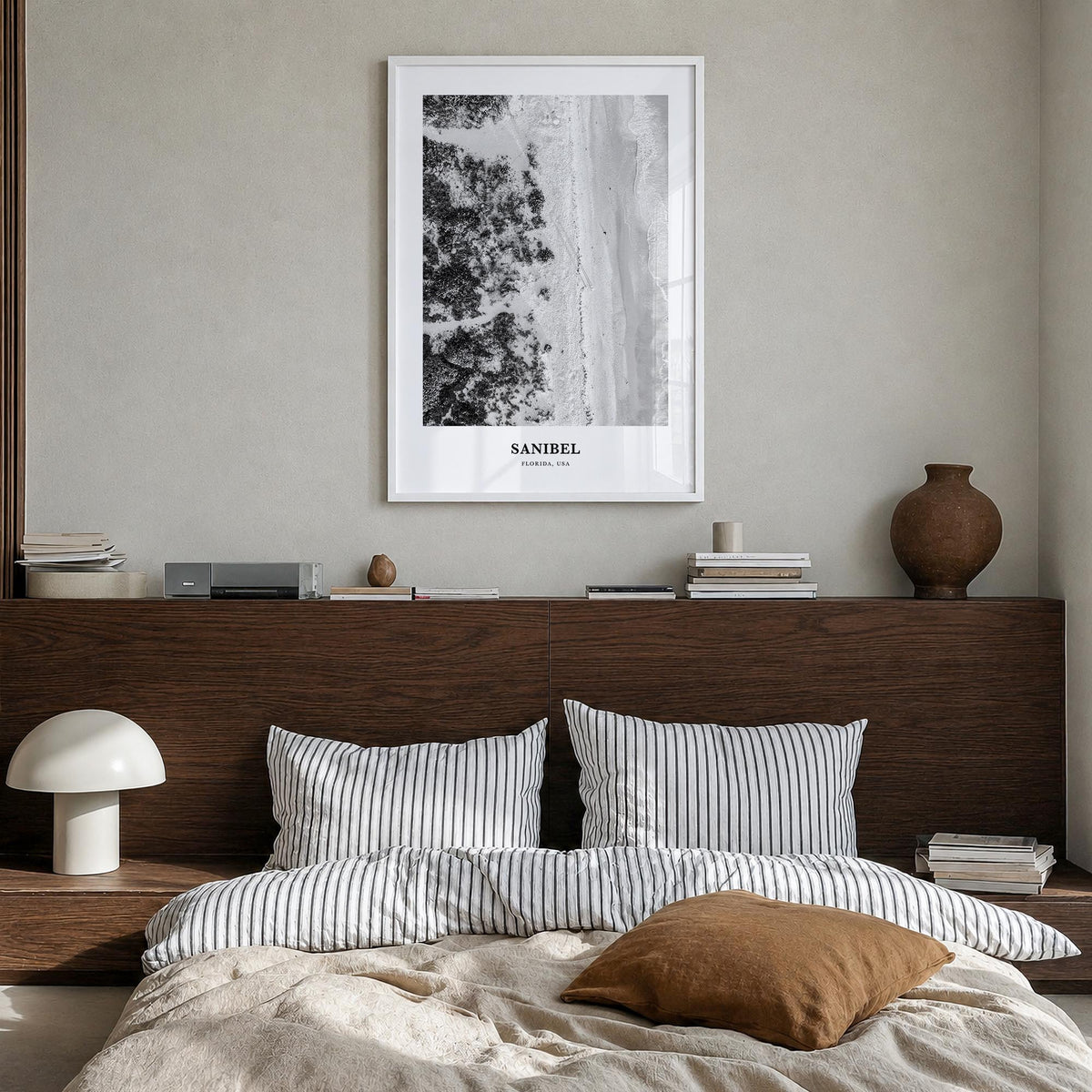Sanibel black & white classic poster of Florida, USA – vertical wall art in white wood frame, hanging on wall