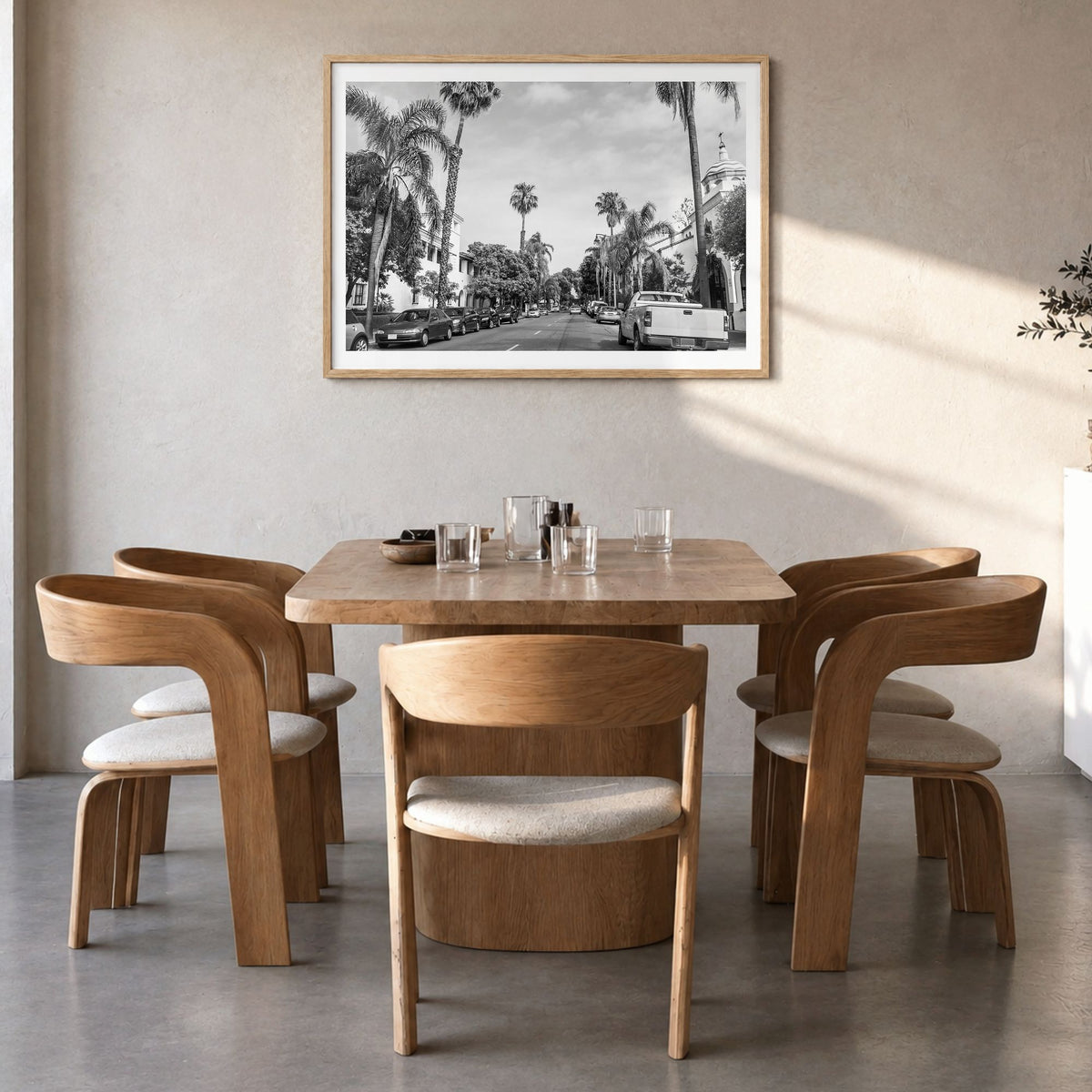 Santa Barbara Photo Poster in a natural wood frame, hanging in a dining room, white border