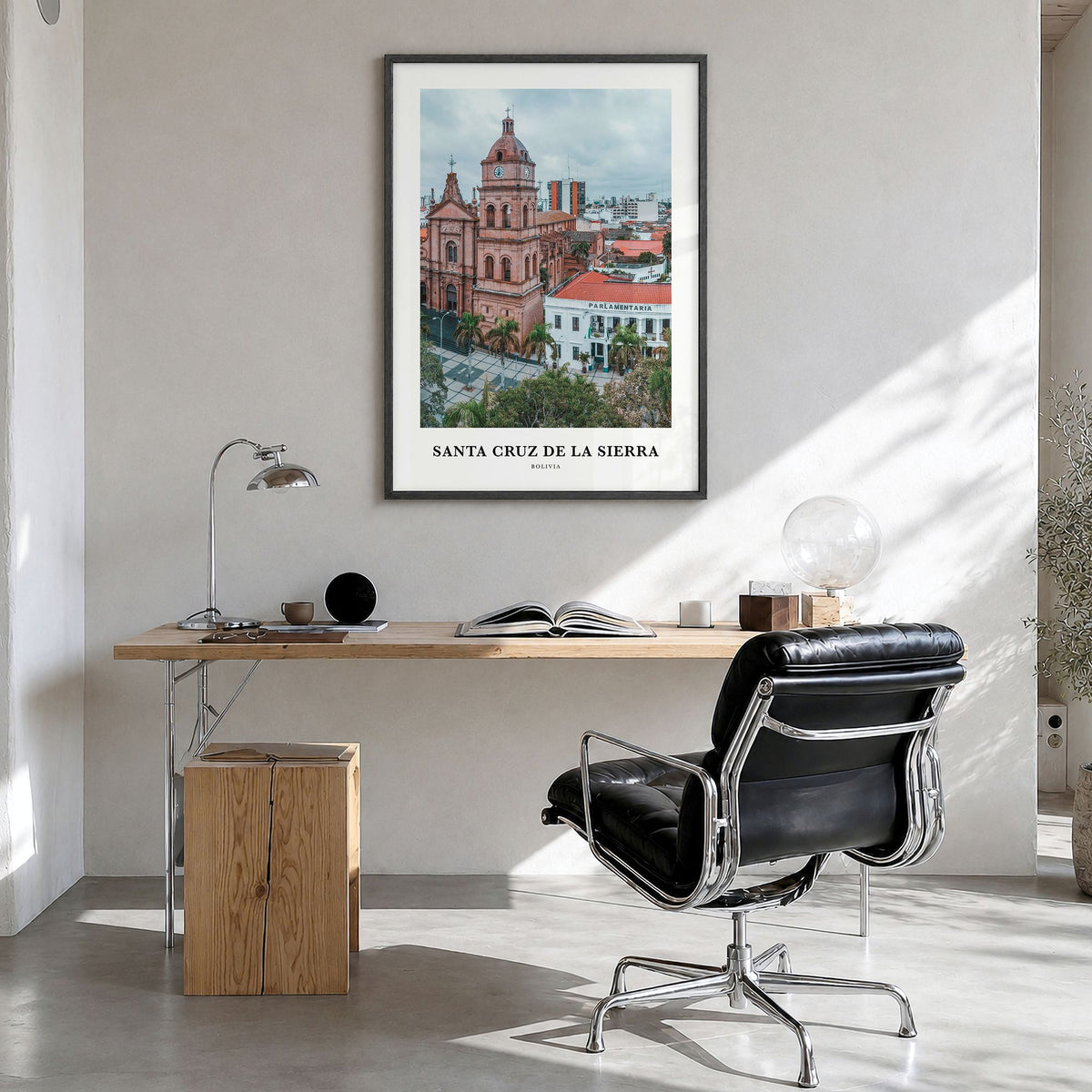 Santa Cruz de la Sierra Classic Poster in a black wood frame, hanging in a bright home office