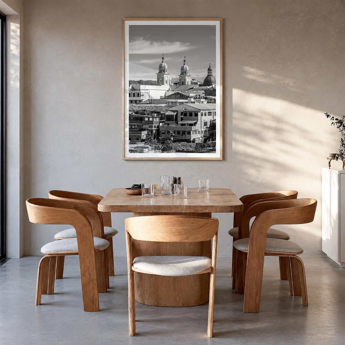 Santiago de Cuba black & white photo poster of Cuba – vertical wall art in natural wood frame with white border, hanging on w