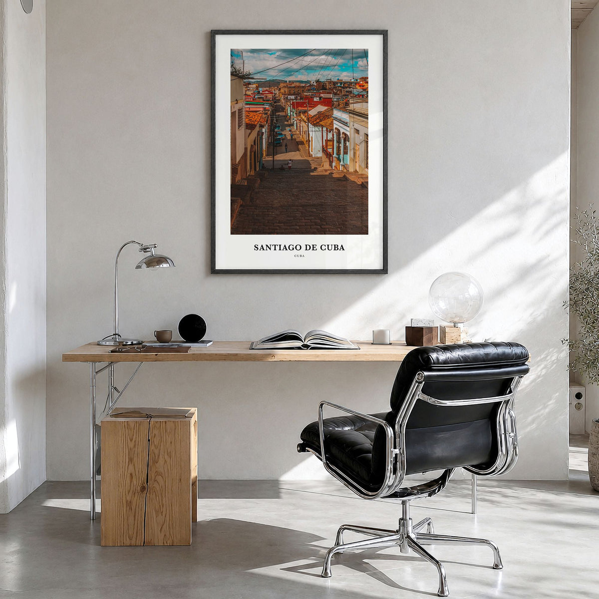 Santiago de Cuba Classic Poster in a black wood frame, hanging in a bright home office