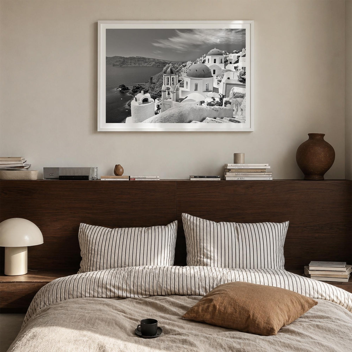 Santorini black & white photo poster of Greece – horizontal wall art in white wood frame with white border, hanging on wall
