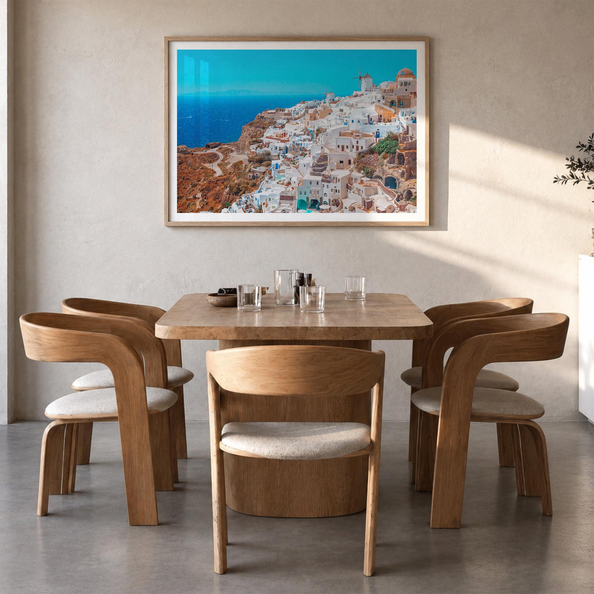 Santorini colorful photo poster of Greece – horizontal wall art in natural wood frame with white border, hanging on wall