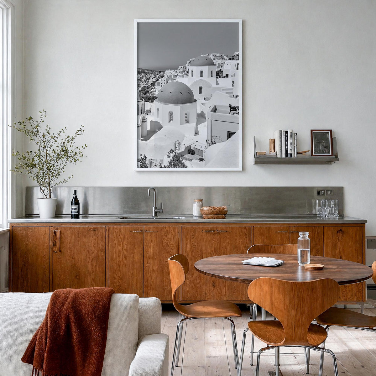 Santorini no. 1 black & white photo poster of Greece – vertical wall art in white wood frame, hanging on wall