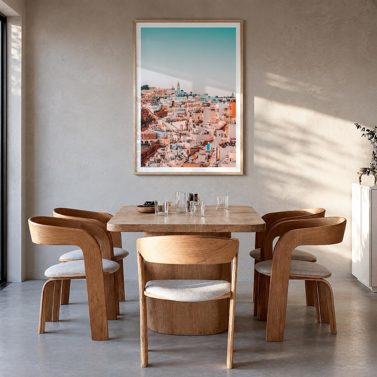 Santorini no. 2 colorful photo poster of Greece – vertical wall art in natural wood frame with white border, hanging on wall