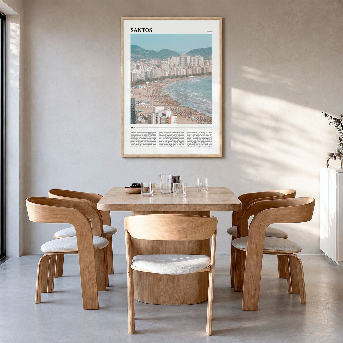 Santos Travel No 1 Poster in a natural wood frame, hanging in a dining room