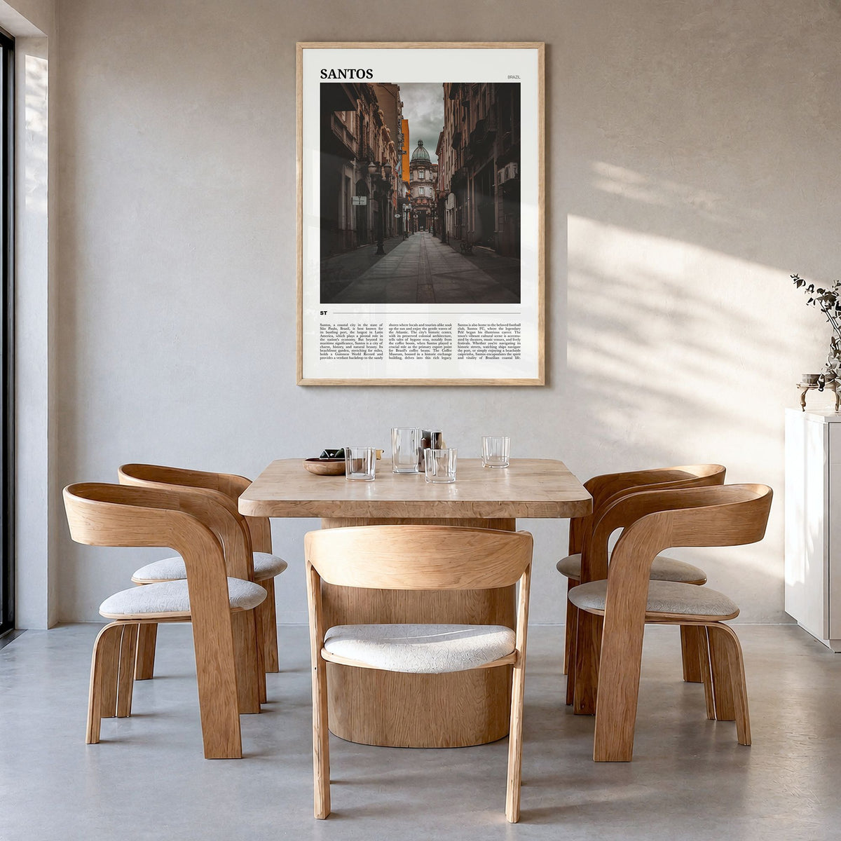 Santos Travel No 2 Poster in a natural wood frame, hanging in a dining room