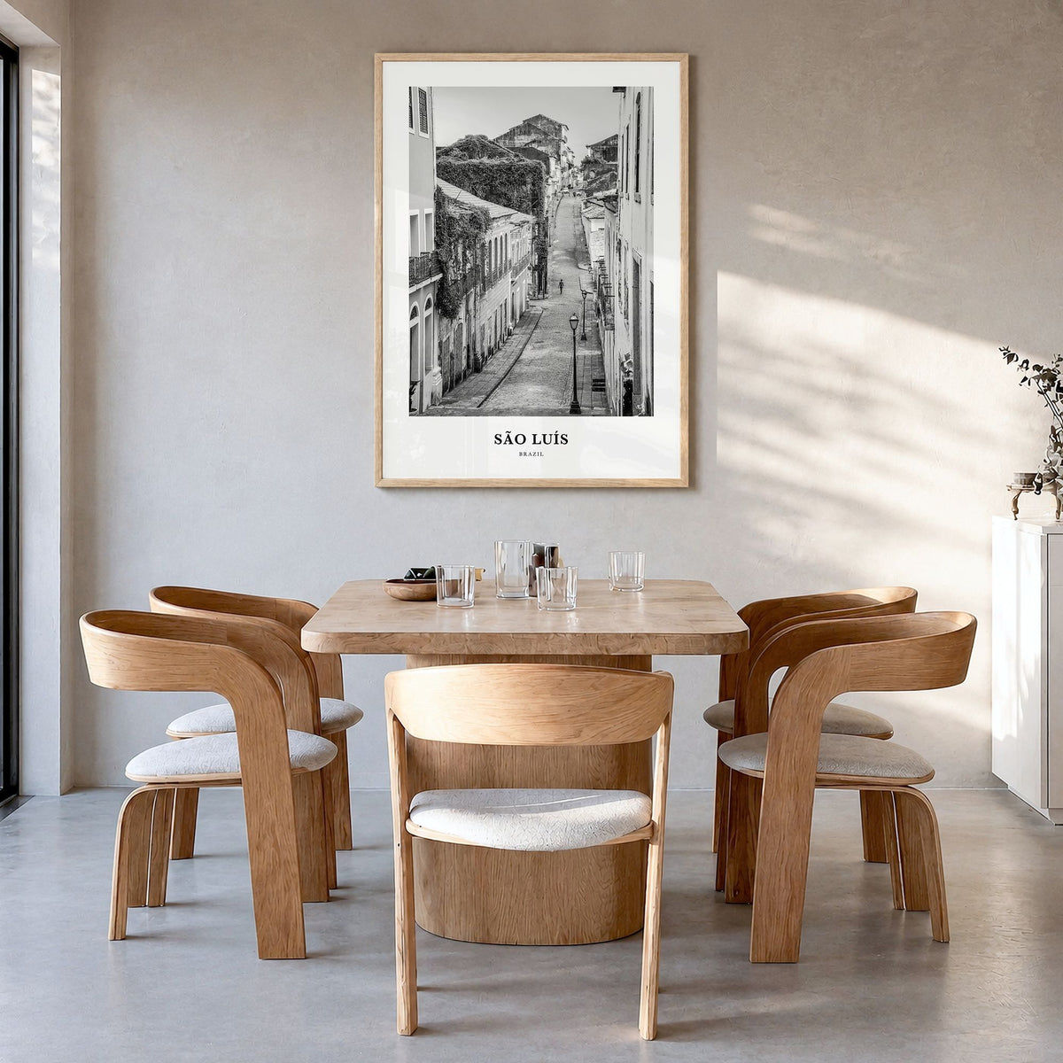 São Luís Classic Poster in a natural wood frame, hanging in a dining room