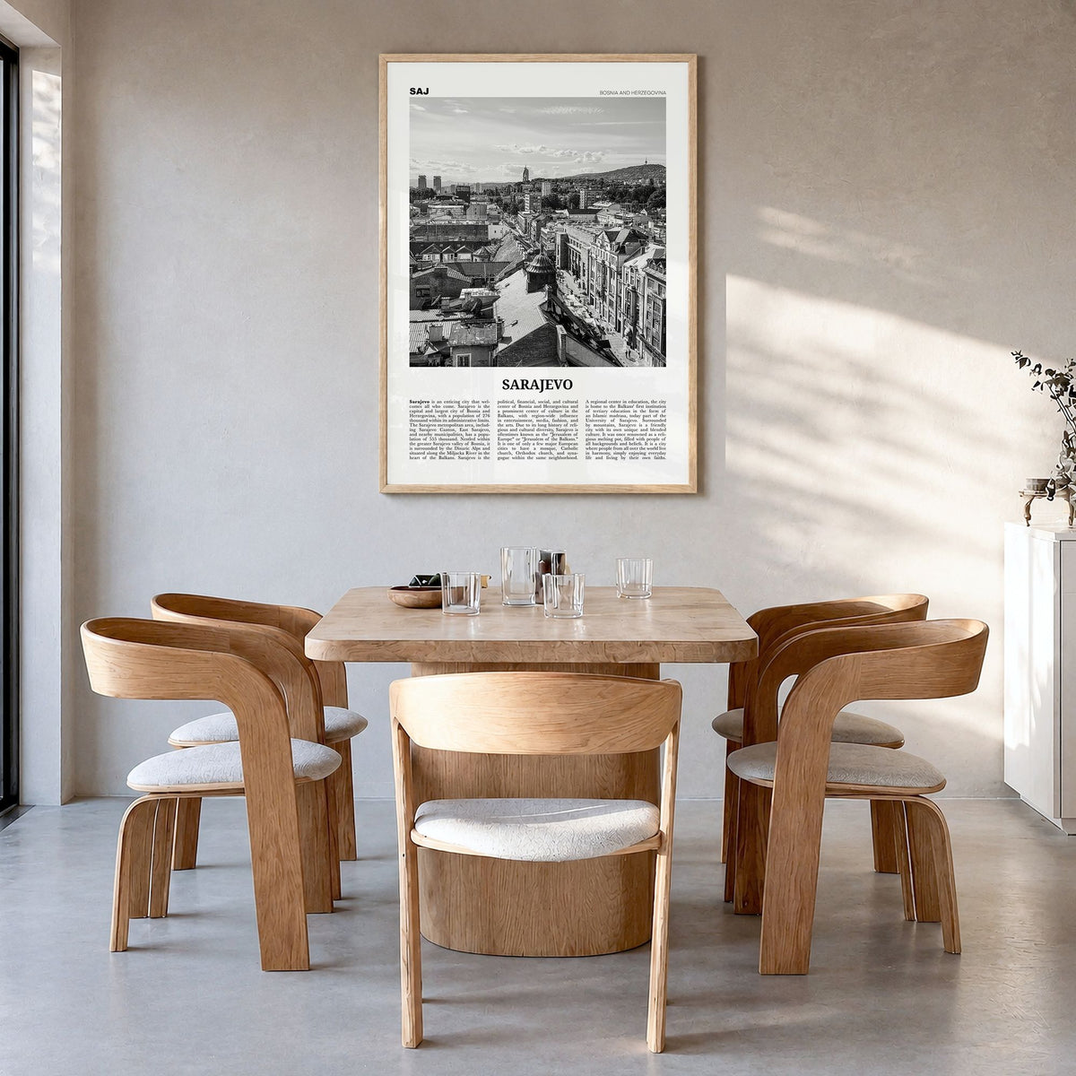 Sarajevo Newspaper Poster in a natural wood frame, hanging in a dining room
