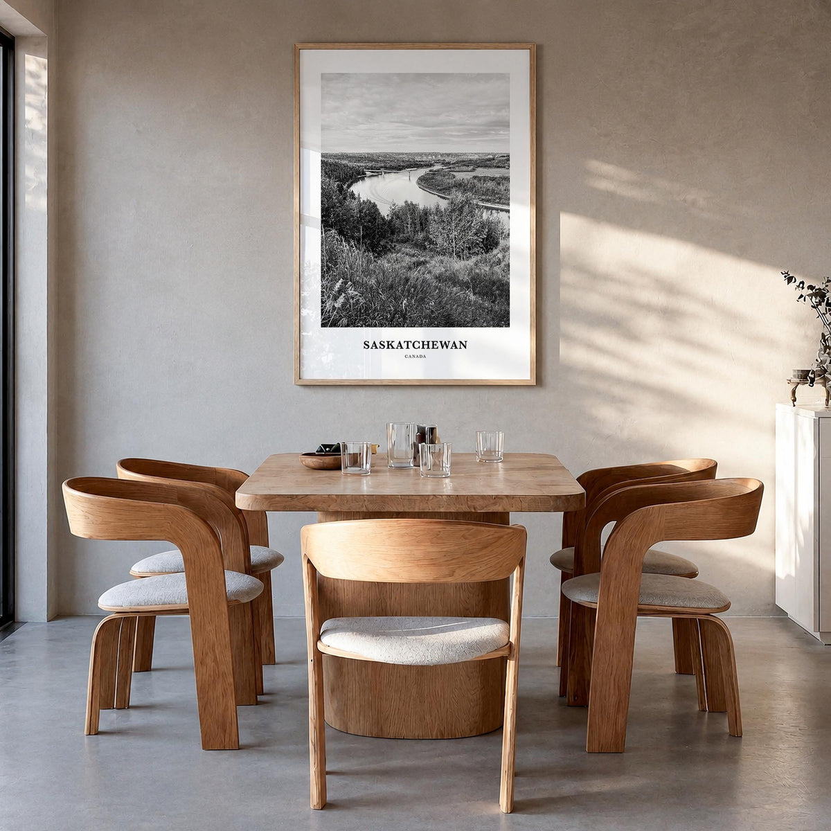 Saskatchewan black & white classic poster of Canada – vertical wall art in natural wood frame, hanging on wall