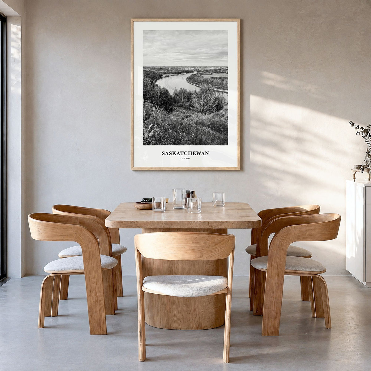 Saskatchewan Classic Poster in a natural wood frame, hanging in a dining room